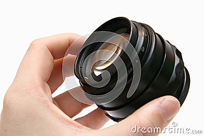 Portray russian old lens in hand Stock Photo