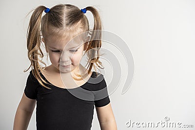 Portret emotional 4 year old girl with two ponytails Stock Photo