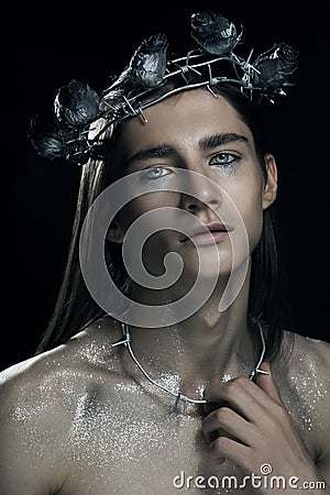 Portrete of fashion young man in the image of a martyr Stock Photo