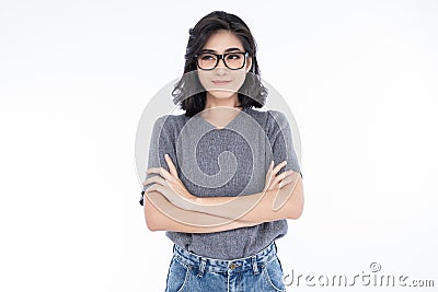 Portriat of Beautiful young Asian woman wearing eyeglasses, looking away and standing isolated on white background. Proud student Stock Photo