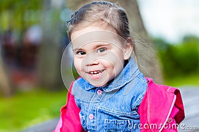Portriat of cute little smilling girl Stock Photo
