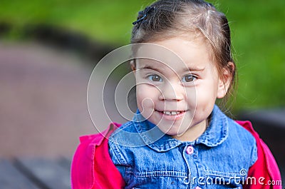 Portriat of cute little smilling girl Stock Photo