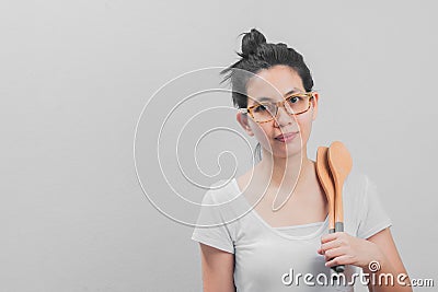 Beautiful Asia Thai Woman Poses with cooking equipment on white Stock Photo