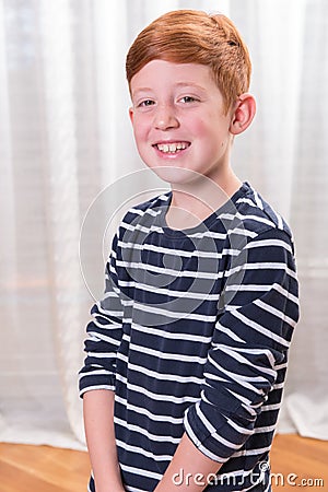 Portriat small boy smiling into camera Stock Photo