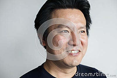 Portriat of smiling Asian man Stock Photo