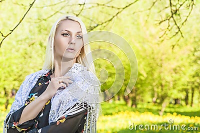 Portrit of Dreaming Caucasian Blond Woman Posing Outside Stock Photo