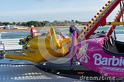 10/12/19 Portsmouth, Hampshire, UK Airplane ride for children at a funfair Editorial Stock Photo