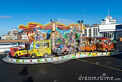 A fairground ride at an amusement park with cars to ride Editorial Stock Photo