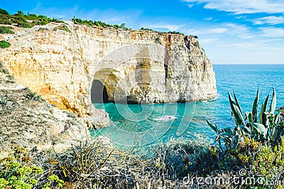 Portugal Algarve beach cave view with local common vegetation Stock Photo