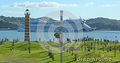 Portugal, Lisbon, Prasa do Imperio, bay view, lighthouse and cruise ship Editorial Stock Photo