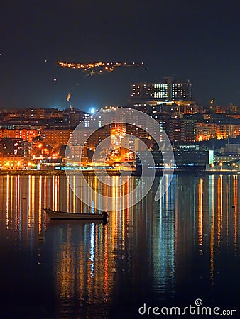 Portugalete at night with city lights and reflections Stock Photo
