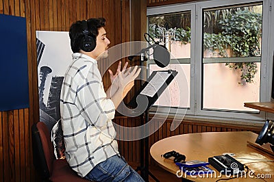 Actor at Recording Studio - Radio Booth - Voice Editorial Stock Photo