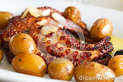 Portuguese dish octopus with potato Stock Photo