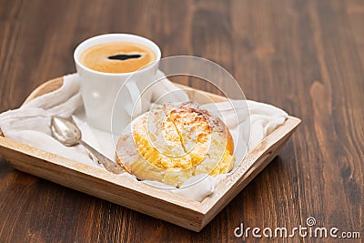Portuguese sweet bread pao de deus with cup of coffee Stock Photo