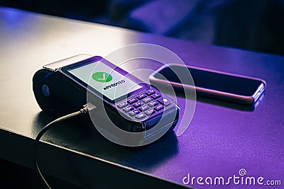 POS terminal, Payment Machine with mobile phone. Contactless payment with NFC technology. Payment approved. modern contactless Stock Photo