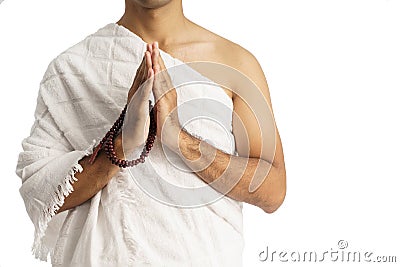 Man wearing ihram muslim clothes for hajj and umrah Stock Photo