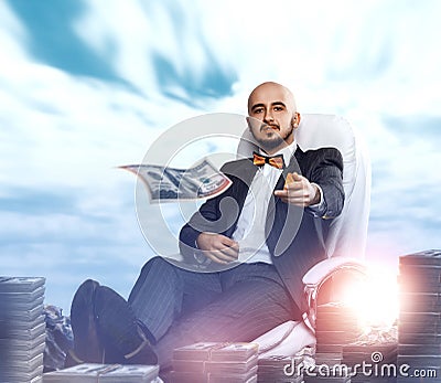 Posh rich man throws money away Stock Photo