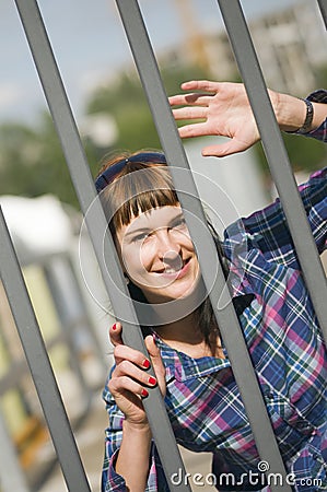 Posing by the fence Stock Photo