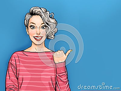 Positiv beautiful smiling woman with curly hair point at something with thumb, has good mood, isolated on blue background. Stock Photo