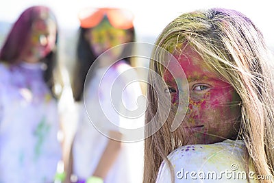 Positive and cheerful. colorful neon paint makeup. children with creative body art. fashion youth party. Optimist Stock Photo