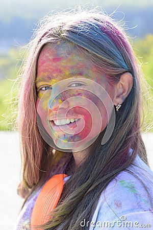 Positive and cheerful. Happy youth party. Optimist. Spring vibes. colorful neon paint makeup. child with creative body Stock Photo