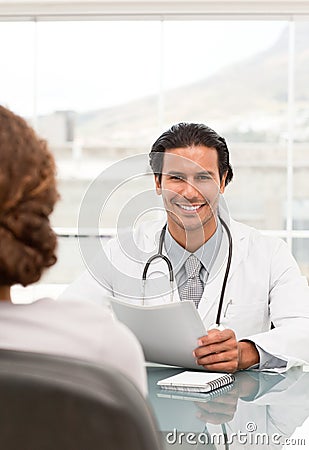 Positive doctor during an appointment Stock Photo
