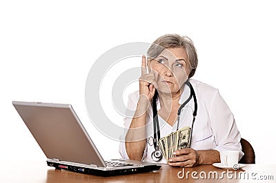 Positive elderly doctor Stock Photo