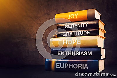 Positive emotions and feelings concept with book titles Stock Photo