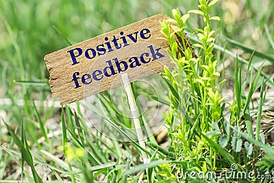 Positive feedback wooden sign Stock Photo