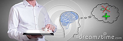 Positive thought concept with man using a tablet Stock Photo