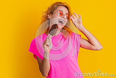 positive woman with icelolly ice cream on background. photo of woman with icelolly ice cream Stock Photo
