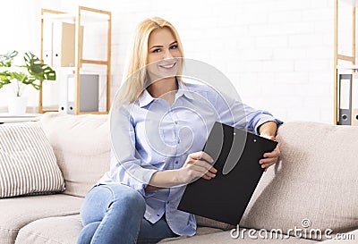 Positive woman mentor friendly smiling at camera Stock Photo
