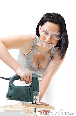 Positive woman work with wood Stock Photo