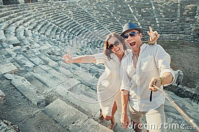 Positive young couple take self photo in Side amphitheatre Stock Photo