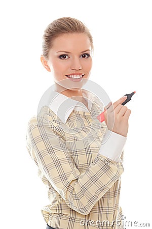 Positive young woman writes something marker Stock Photo