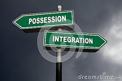 Possession or Integration - Direction signs Stock Photo