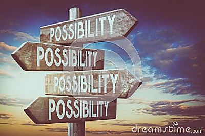 Possibility - wooden signpost, roadsign with four arrows Stock Photo