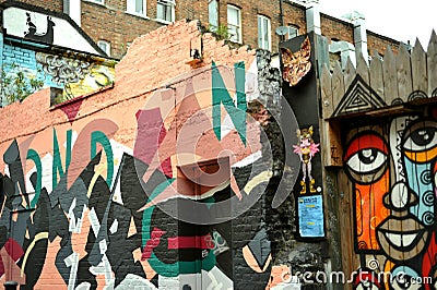 Possibly the most famous location in the UK to find street art and graffiti. Brick Lane is synonymous with the street art and graf Editorial Stock Photo