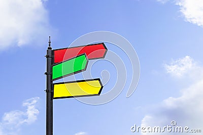 Post with blank signposts with a space for text. A pillar with red, green and yellow pointers for information, directions, Stock Photo