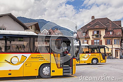 Post buses in Ilanz Editorial Stock Photo