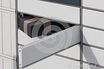 Post locker. Delivery automat terminal , placed parcel in delivery box Stock Photo