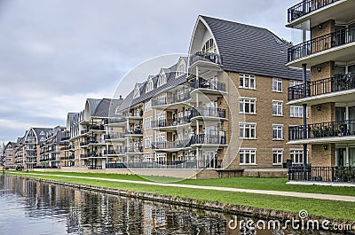 Post modern housing along a canal Editorial Stock Photo