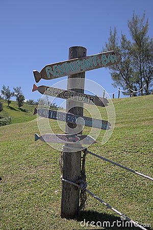 Post sign directing to vacation places Stock Photo