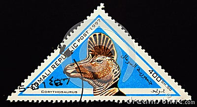 Triangle postage stamp 1997. Corythosaurus dinosaur Editorial Stock Photo