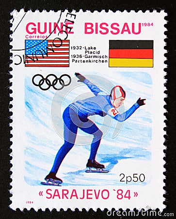 Postage stamp Guinea Bissau 1984, Olympic Games ice speed skating Editorial Stock Photo