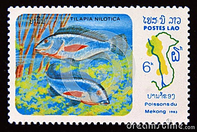Postage stamp Laos, 1983. Nile Tilapia Tilapia nilotica fish Editorial Stock Photo