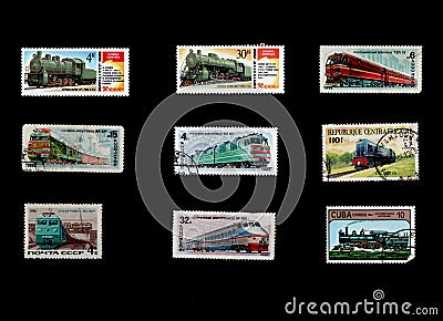 Post stamps printed in USSR and Republique Centrafricaine of steam locomotives Editorial Stock Photo