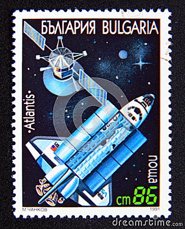 Postage stamp Bulgaria, 1991. Satellite and Atlantis space shuttle Editorial Stock Photo