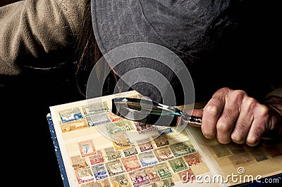 Postage stamp collector Editorial Stock Photo