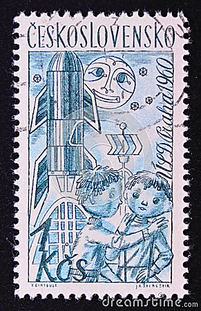 Postage stamp Czechoslovakia, 1960, draw of two kids near the rocket Editorial Stock Photo